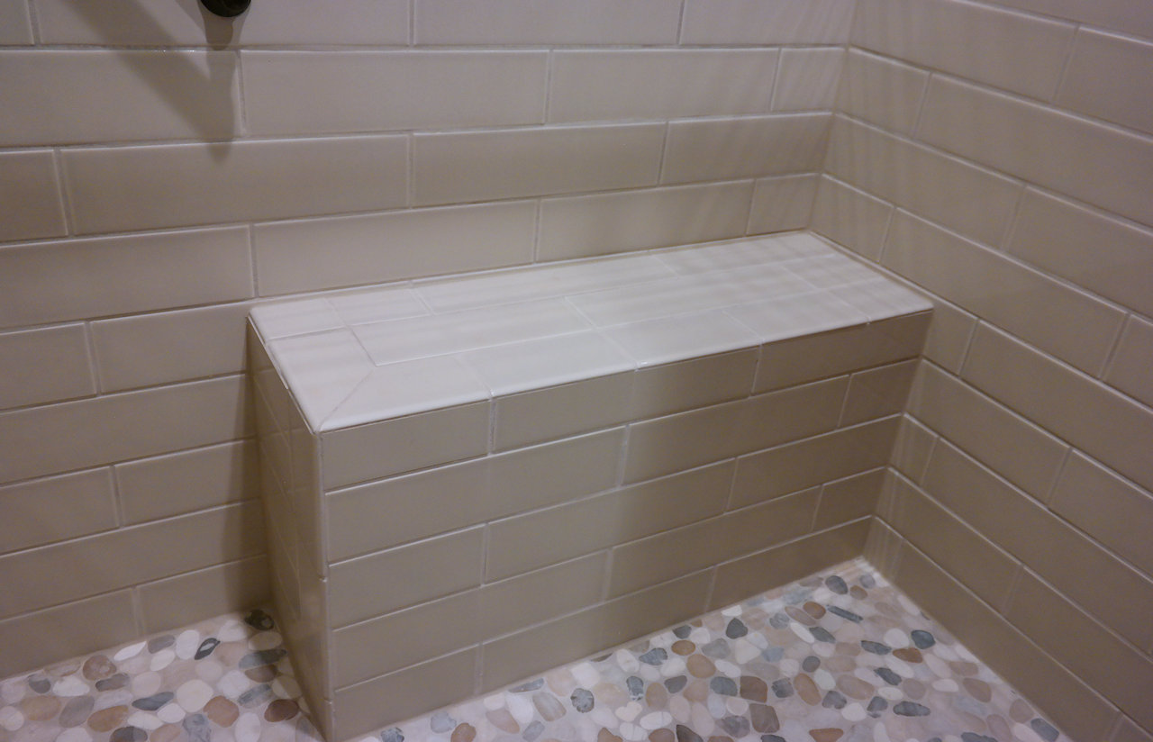 Shower seat and new tile work.