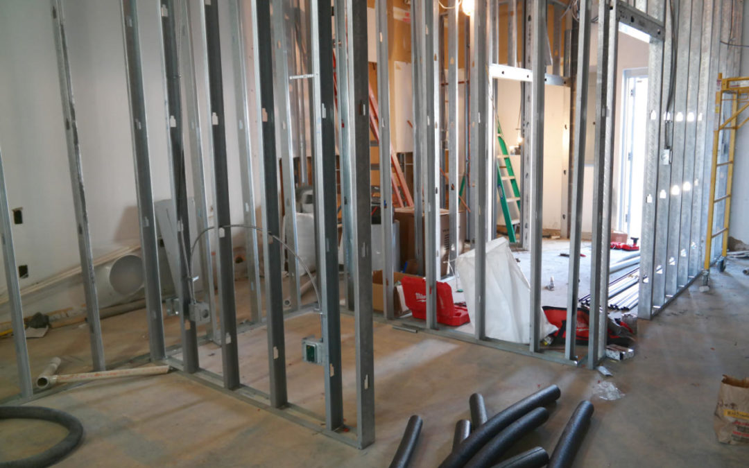Reframing walls in a commercial office remodel