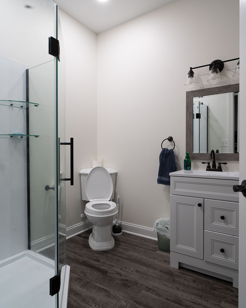 A new bathroom with stand up shower addition