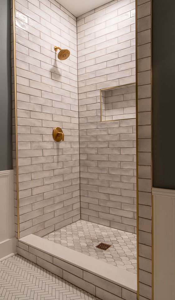 A newly remodeled shower with premium tile